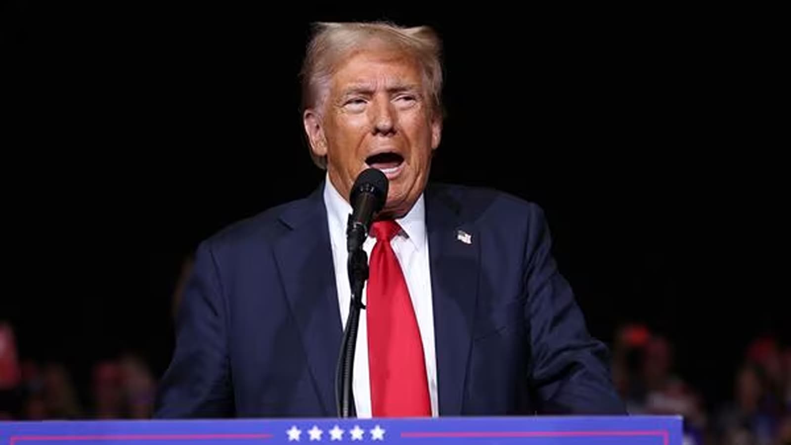 President-elect Donald Trump points at AmericaFest in Phoenix on Dec 22 Trump pledged to have the Justice Department pursue the death penalty following President Biden's move to commute death sentences for 37 inmates. (Source: AP)